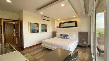 2 habitaciones, caja de seguridad en la habitación y escritorio