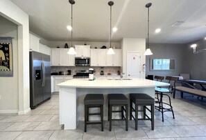 Fridge, microwave, oven, stovetop - Modern 5BR with Private Pool in Solterra Resort Near Disney (Davenport)
