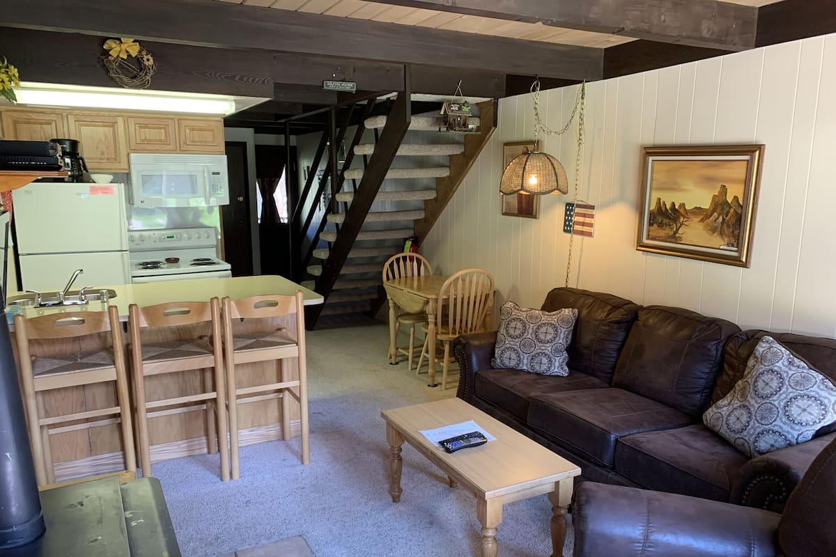 #3 - 2 Bedroom Studio | Living area | Flat-screen TV, fireplace