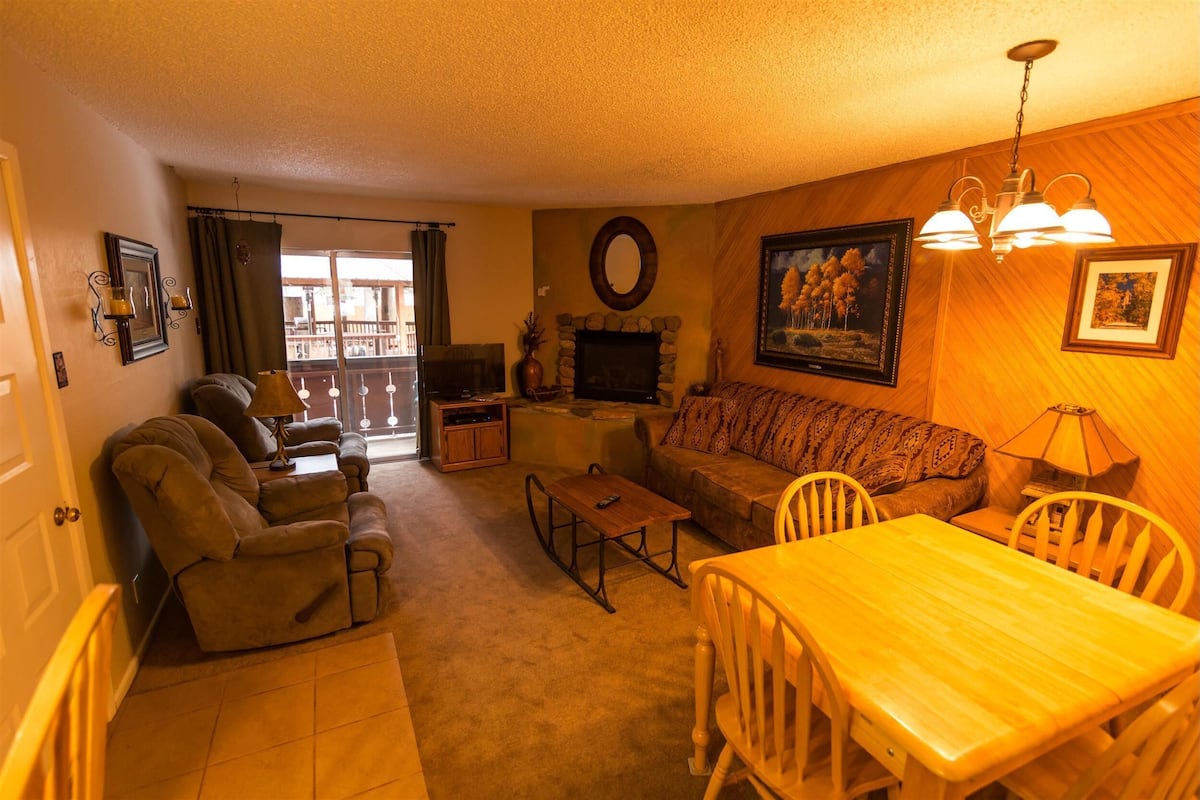 17A - 2 Bedroom Condo | Living area | Flat-screen TV, fireplace