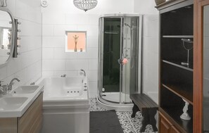 Combined shower/tub, hair dryer