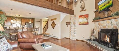 Smart TV, fireplace, books