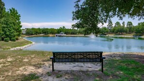 A park with a lake, a gazebo, and a bench. - Home away from Home (Lexington)
