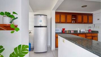 Apartment | Private kitchen | Fridge, microwave, oven, cookware/dishes/utensils