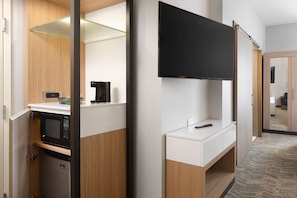 Premium bedding, down comforters, desk, laptop workspace