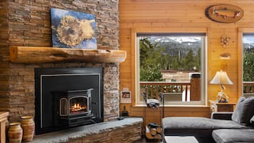 Cabin | Living room | 49-inch LED TV with satellite channels, TV, fireplace