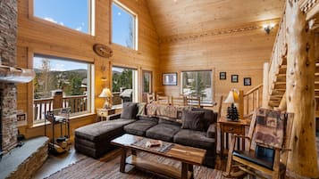 Cabin | Living room | 49-inch LED TV with satellite channels, TV, fireplace