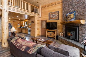 Cabin | Living room | 49-inch LED TV with satellite channels, TV, fireplace