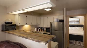 Fridge, microwave, stovetop, coffee/tea maker