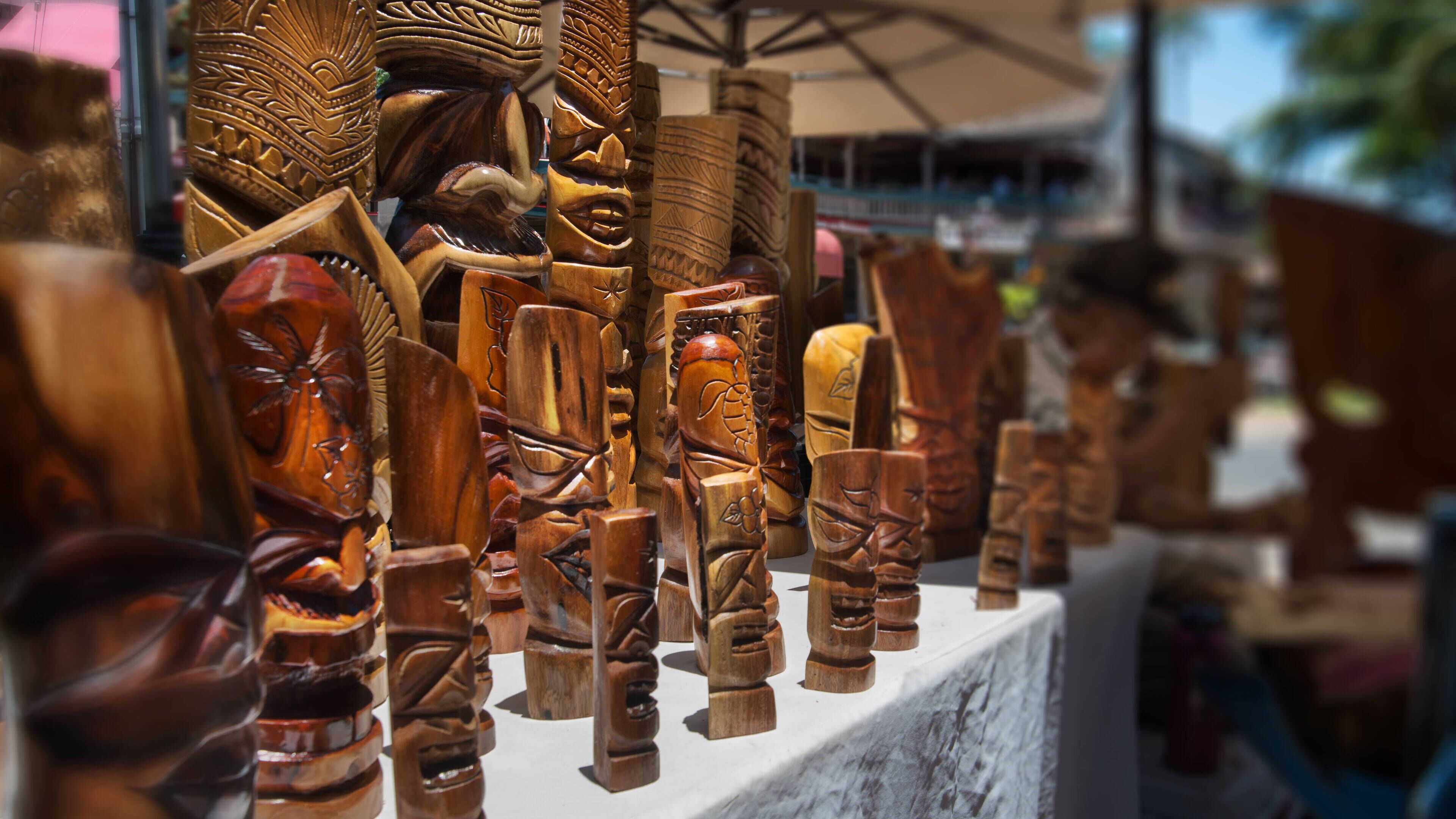 A display of intricately carved wooden figures.