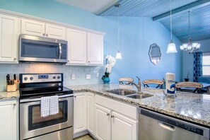 Condo, Multiple Beds, Patio (Turquoise Trea'shore) | Private kitchen | Fridge, microwave, oven, stovetop