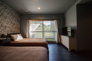 Kahden hengen huone (kaksi sänkyä) | Pimennysverhot, silitysrauta/-lauta, ilmainen Wi-Fi