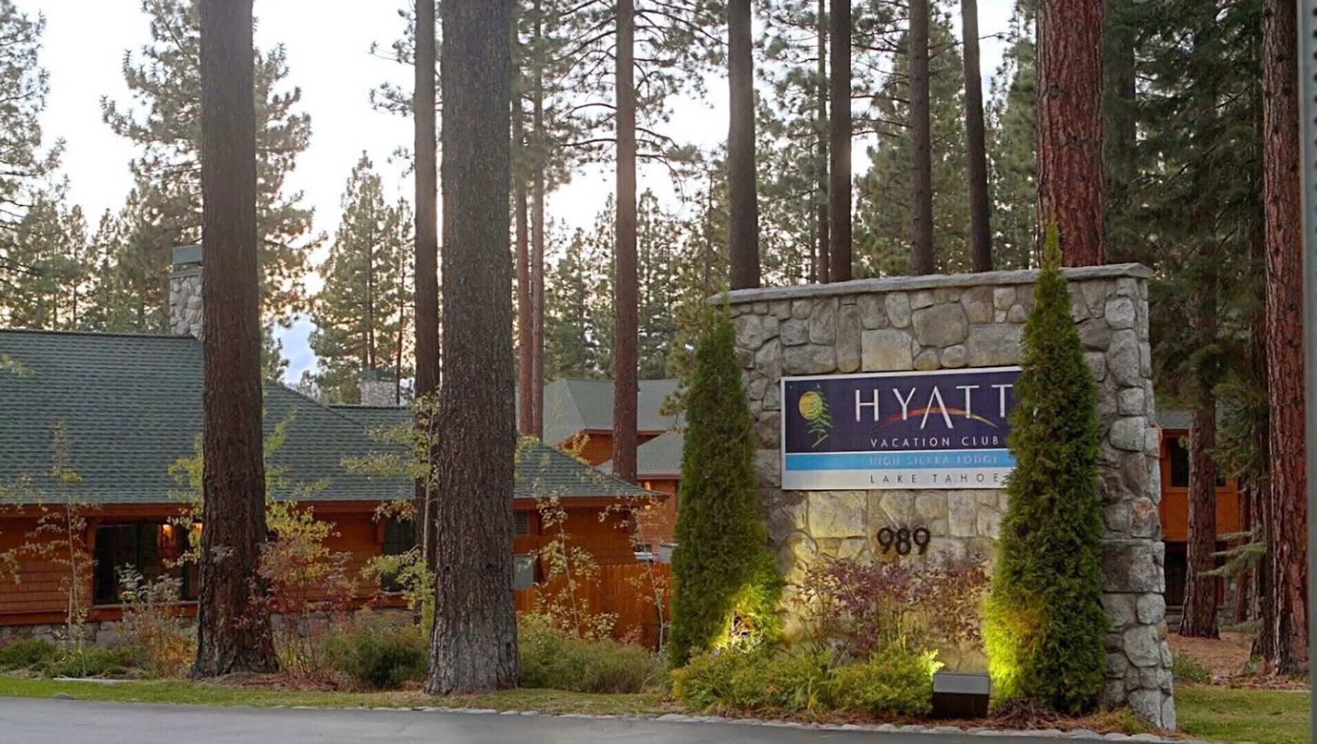 A stone sign with the text "HYATT VACATION CLUB" and "LAKE TAHOE" indicating the location of the property.