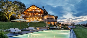 Gipfelglück-chalet-suite mit 60qm, Schlafzimmer, Wohnraum mit Küche und Bad mit Sauna