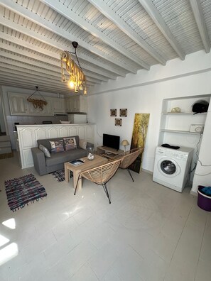 Traditional Apartment | Living area | Flat-screen TV - Myconian Avra Apartment (Mykonos)