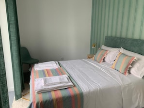 Family Apartment | Blackout drapes, soundproofing, iron/ironing board, travel crib