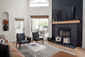 TV, fireplace, offices - Handsome Modern • Pool, Putt, Views, Near Taliesin (Scottsdale)