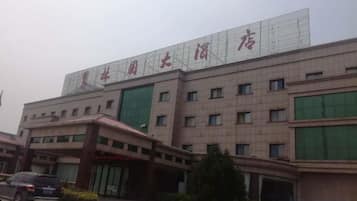 A building with a large sign above the entrance.