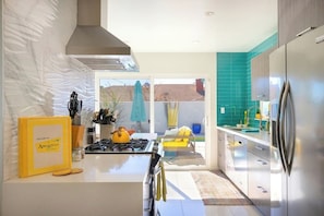 Coffee/tea maker, fridge, microwave, oven