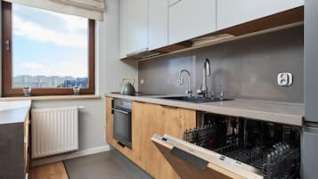 Apartment, 1 Bedroom, Balcony | Private kitchen | Dishwasher, cookware/dishes/utensils