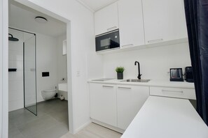Standard Double Room | Private kitchen | Fridge, oven, stovetop, dishwasher