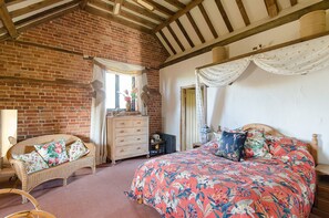 Habitación doble Deluxe | Ropa de cama de alta calidad y decoración personalizada