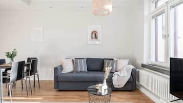 Exclusive Apartment | Living area | 42-inch Smart TV with cable channels, TV