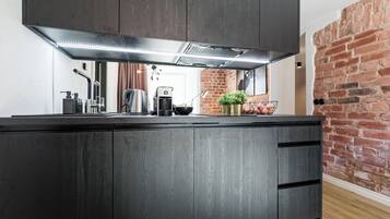 Comfort Apartment | Private kitchen | Full-size fridge, dishwasher, coffee/tea maker, electric kettle
