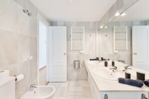 Bathtub, hair dryer, towels
