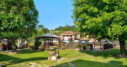 Magnifique "Appartement Jasmin", dans le Piémont, avec piscine commune, jardin et sauna