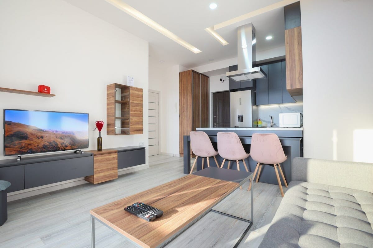 Comfort Apartment | Living area | TV