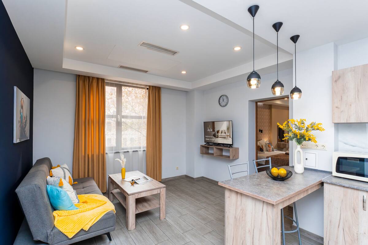Standard Apartment, 1 Bedroom | Living area | TV