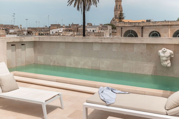 Seasonal outdoor pool, pool umbrellas, pool loungers