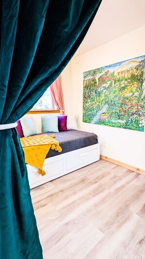 2 bedrooms, blackout curtains, iron/ironing board, travel cot