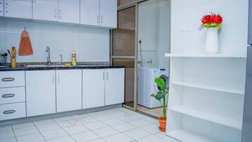 Apartment | Private kitchen | Fridge, microwave, oven, stovetop