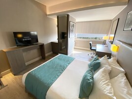 Ropa de cama de alta calidad y minibar