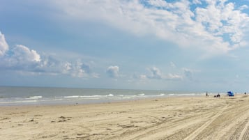 On the beach, sun-loungers, beach towels