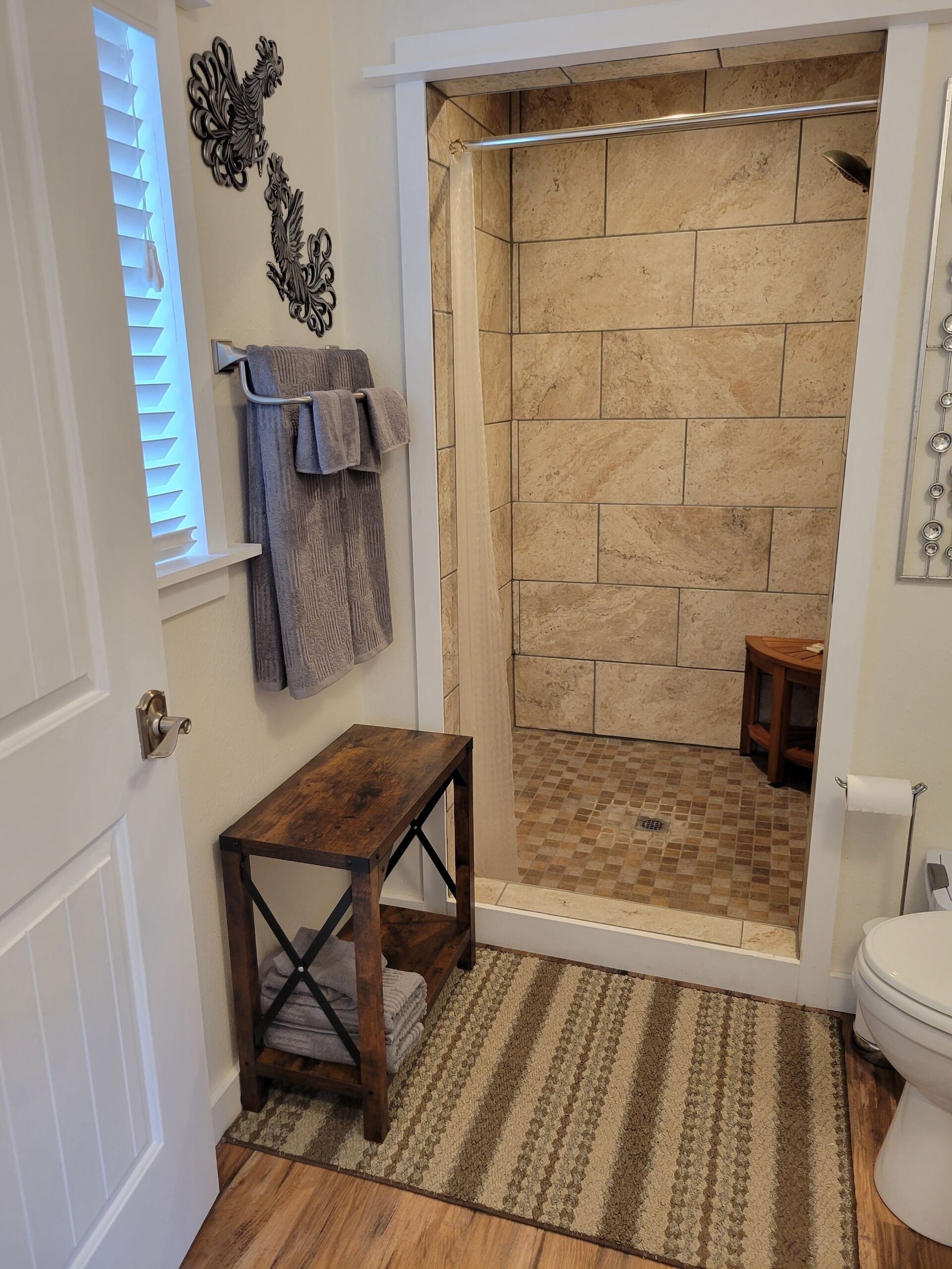 Shower, towels, toilet paper