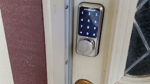 A door with a numeric keypad lock and a brass door handle. - Quiet and comfortable Two Bedrooms, one Bathroom up to group of Four. (Mission)