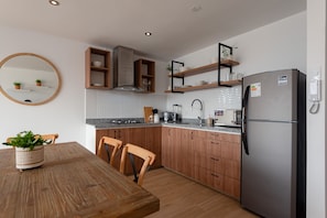 Microwave, oven, dining tables