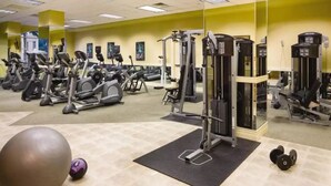 A gym with various exercise equipment, including treadmills, ellipticals, and weight machines. - Resort near airport, convention center & casinos. (Las Vegas)