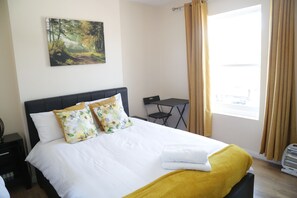 1 bedroom, desk, iron/ironing board, travel cot