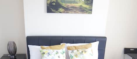 1 bedroom, desk, iron/ironing board, travel cot