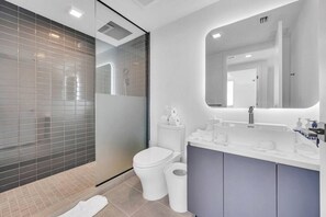 Hair dryer, towels, soap, shampoo