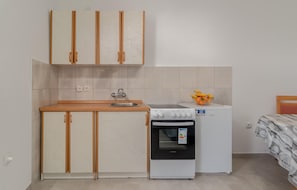 Fridge, stovetop, coffee/tea maker, cookware/dishes/utensils