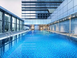 Seasonal outdoor pool, open 6:30 AM to 10:00 PM, pool loungers