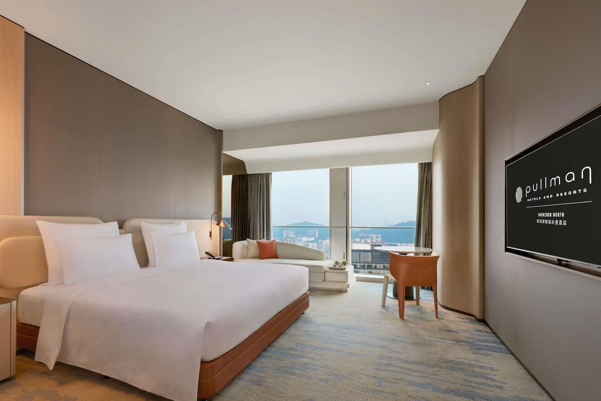 Premium-rum - 1 kingsize-säng | Värdeförvaringsskåp på rummet, mörkläggningsgardiner och extrasängar