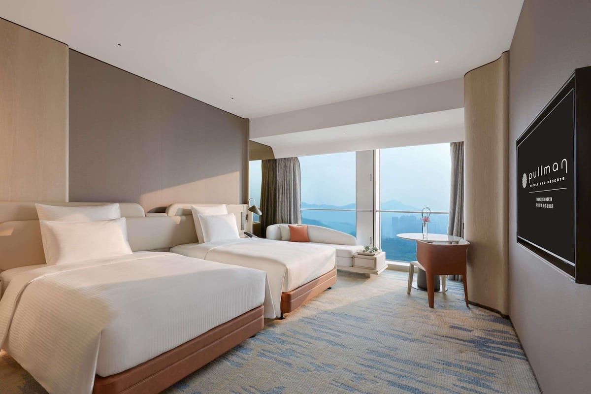 Premium Room, 2 Double Beds | In-room safe, blackout drapes, rollaway beds, bed sheets