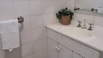 Shower, towels, toilet paper