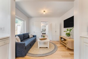 55-inch TV with digital channels, foosball, streaming services